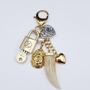 Authentic Louis Vuitton Padlock w/Unbranded Resin Horn Stainless Steel Keycharm